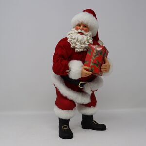 Dept. 56 Possible Dreams Santa Claus 12-inch Figurine Holding Present Gift